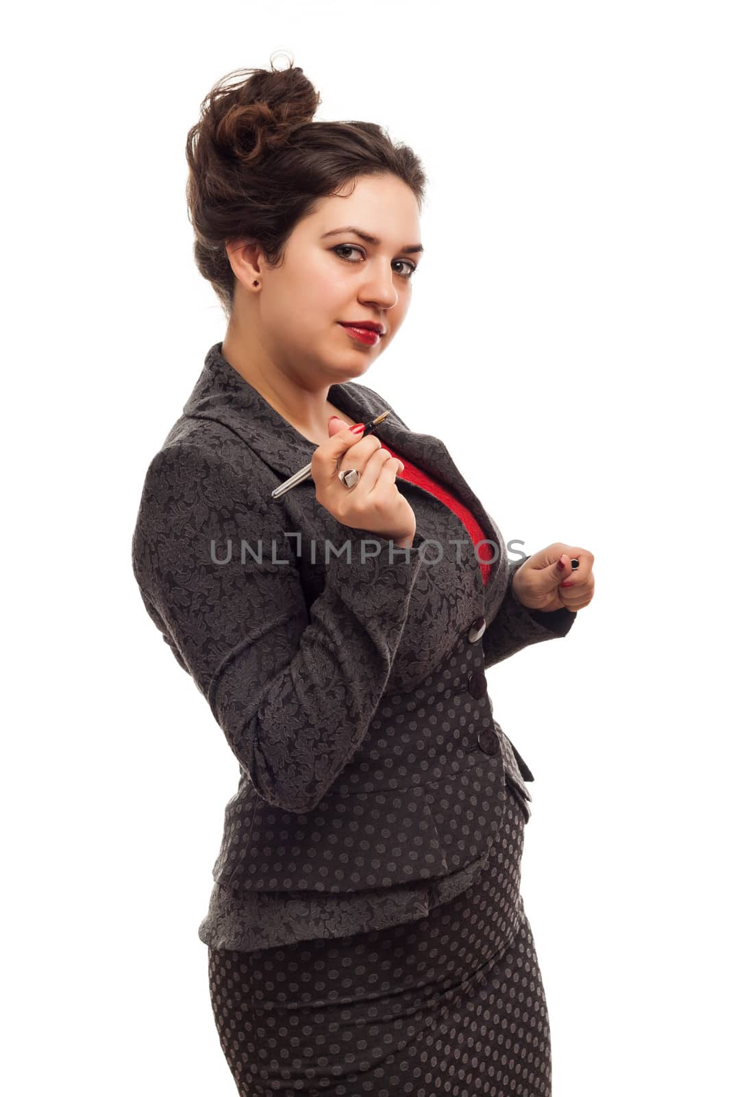 Confident business woman portrait with pen isolated over a white background