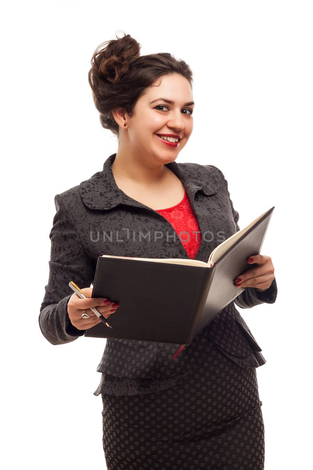 Confident business woman portrait  with notebook isolated over a white background