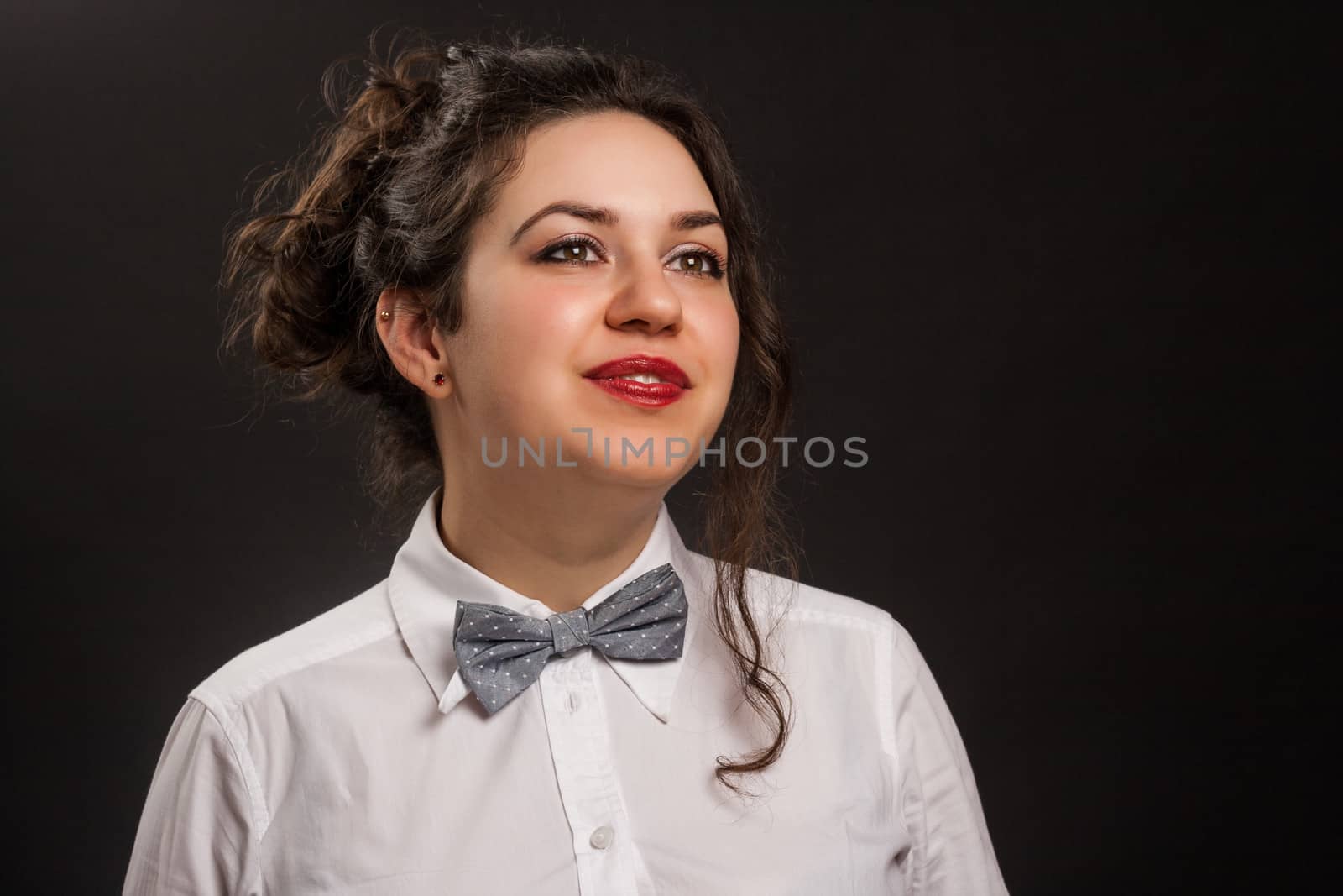 stylish confident woman portrait , with dark background