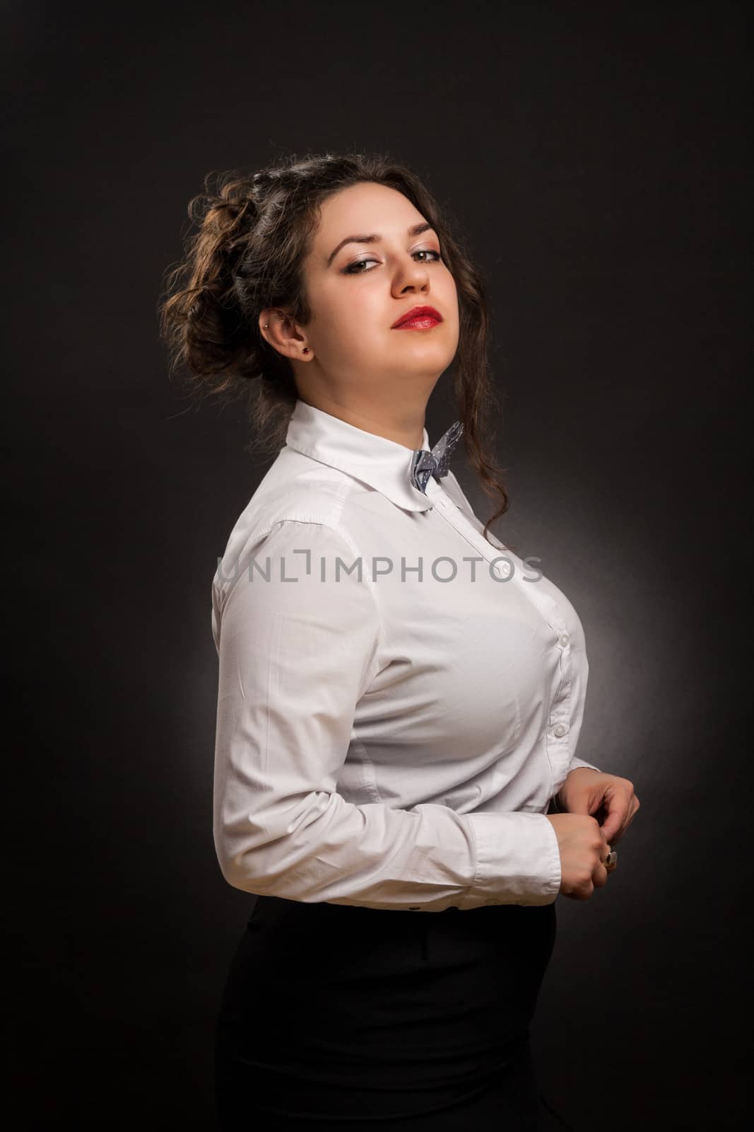 stylish confident woman portrait , with dark background