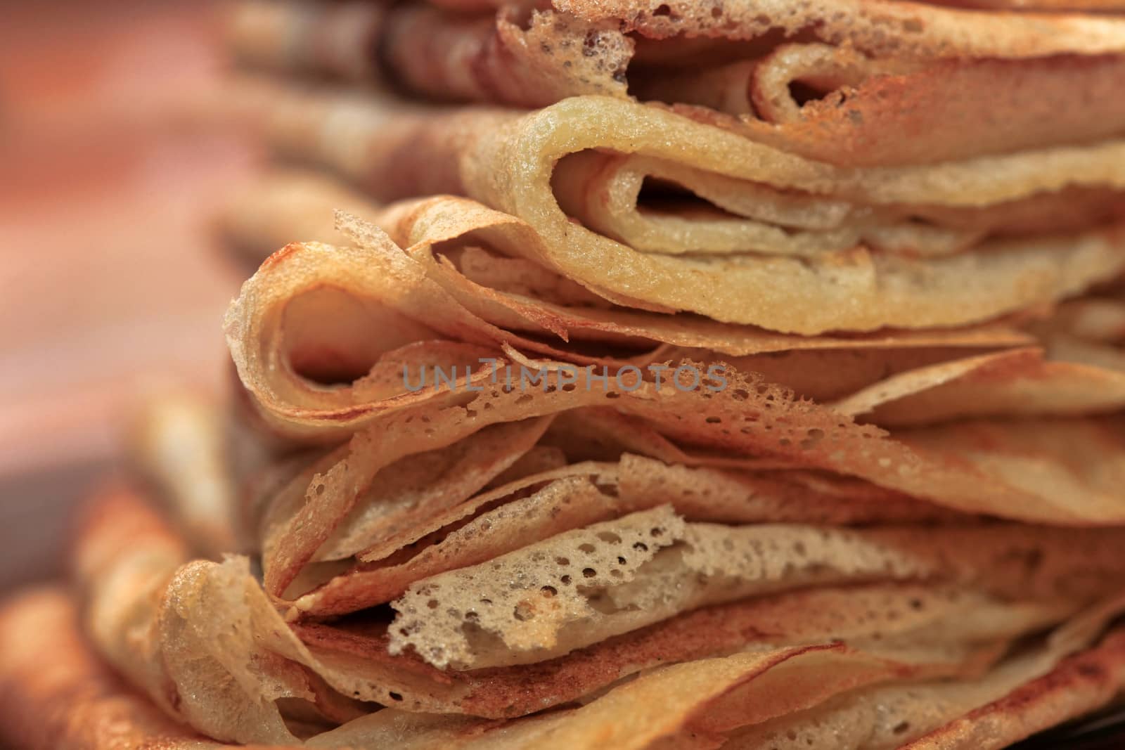 Close up of a pancakes pile with copy-space on the top