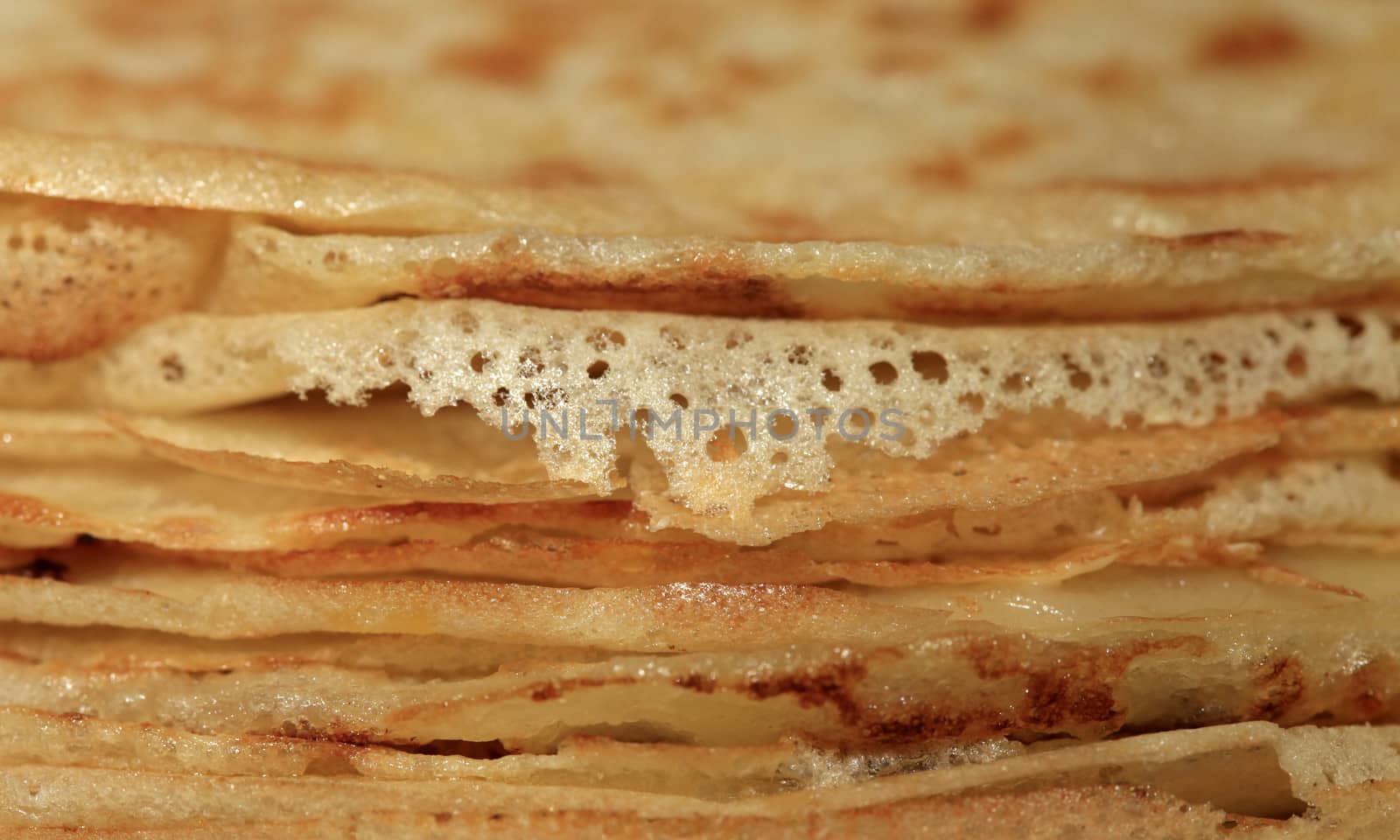 Close up of a pancakes pile with copy-space on the top