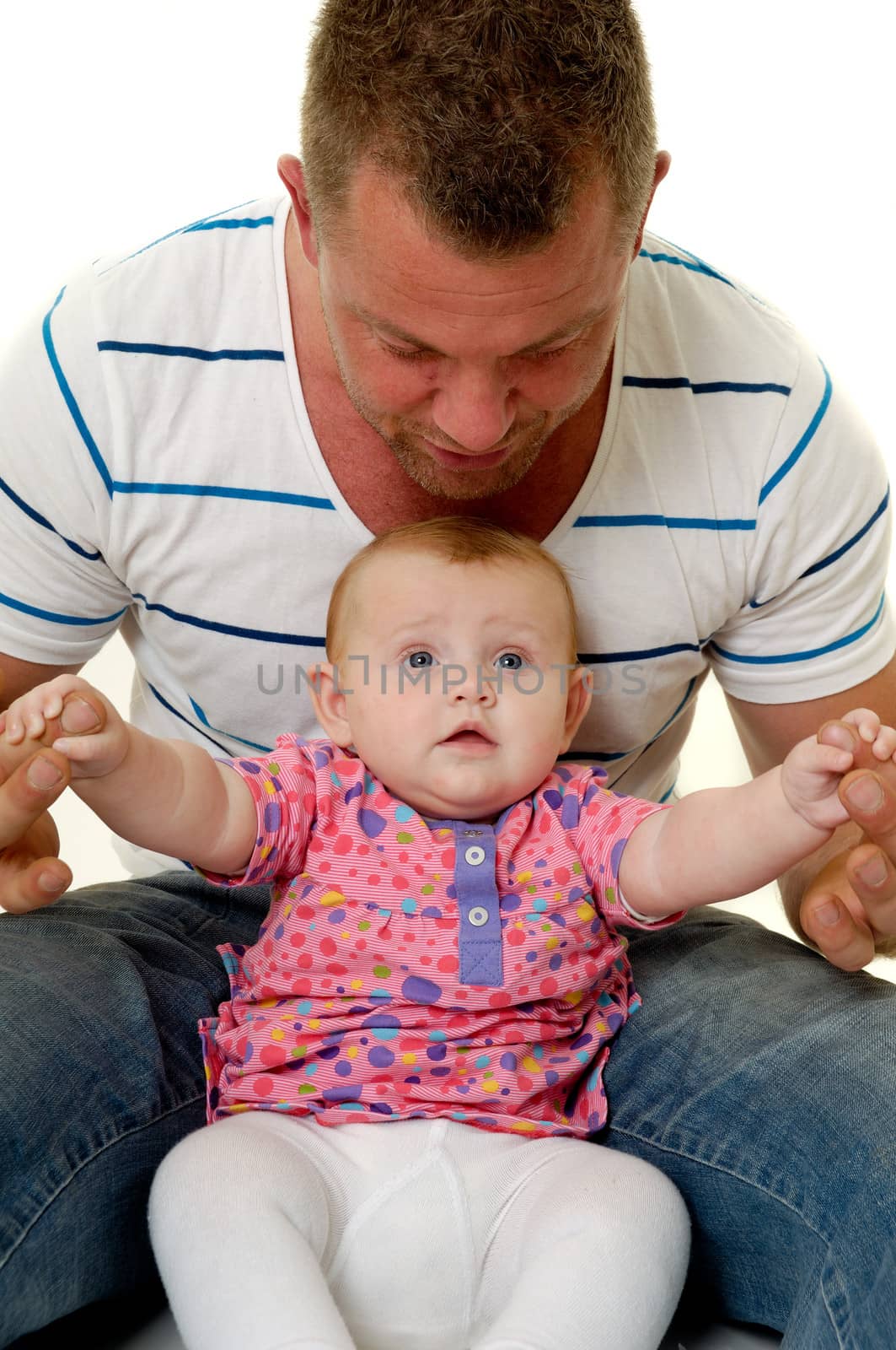 Happy smiling baby and father are playing. The baby 3 month old. Isolated on a white background.