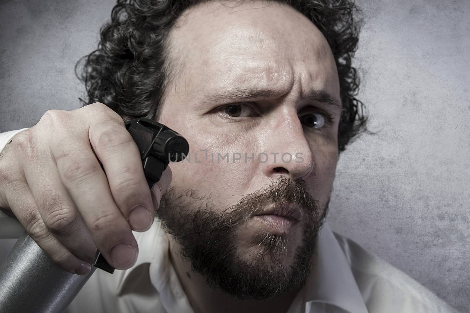 businessman with a spray, cleaning, man in white shirt with funny expressions