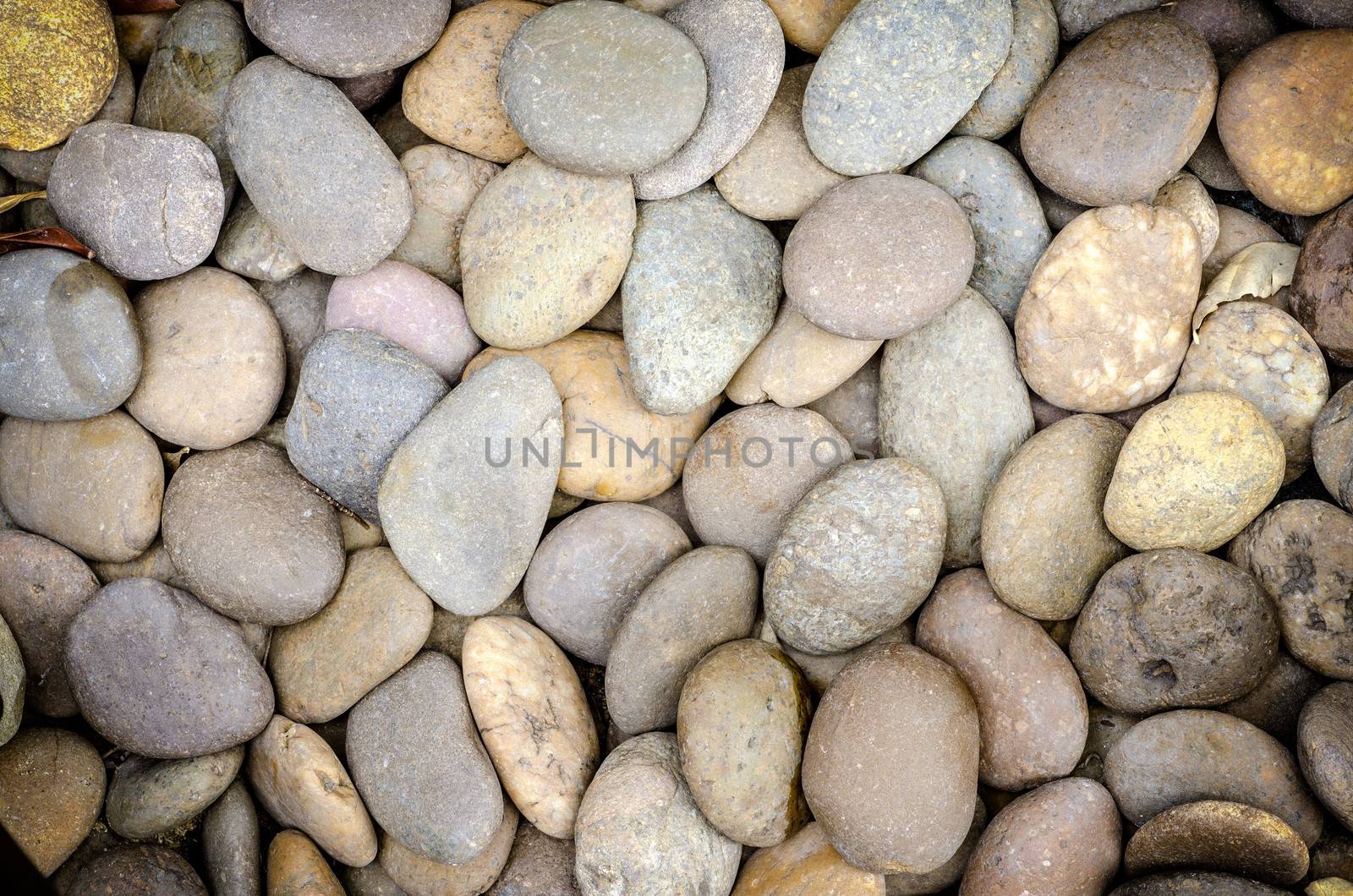 river rock textured background. Hi-res, close up. 