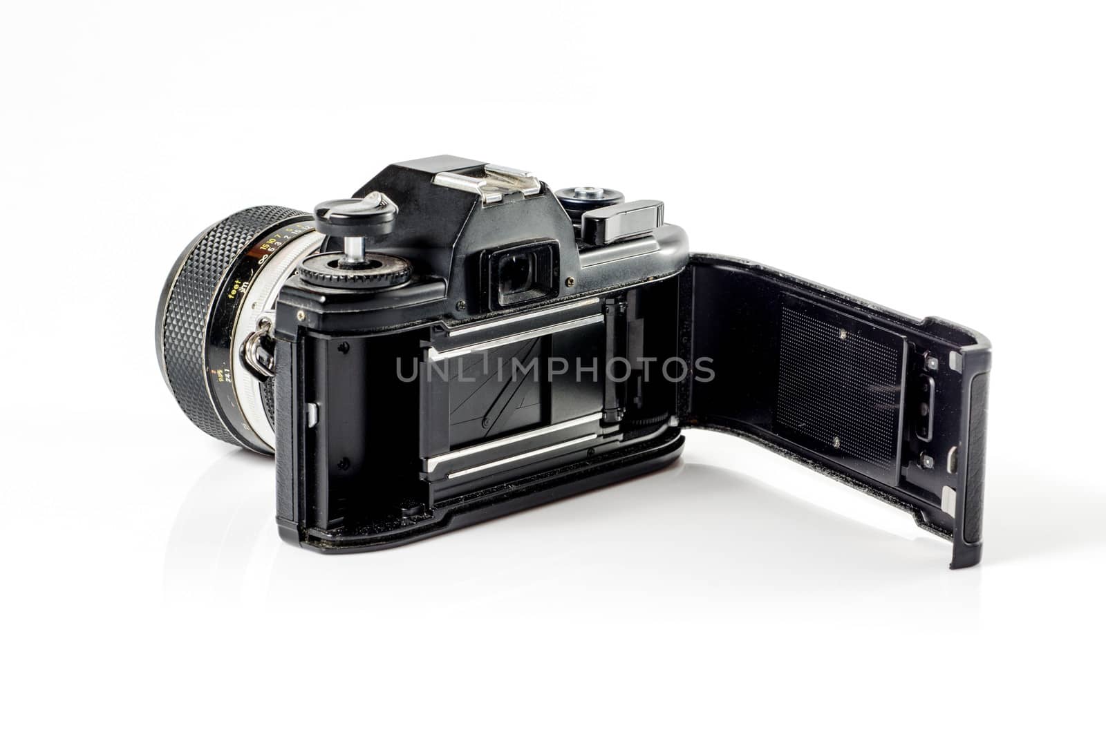 Inside view of a film photo camera  isolated on white :Clipping path included   by 9george