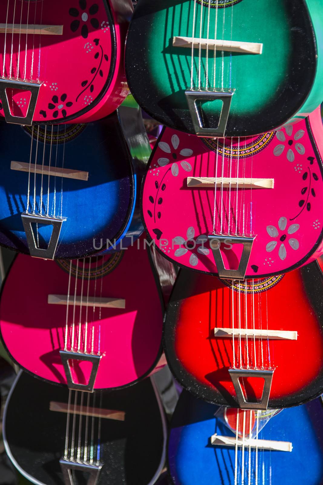 display of colorful toy guitar