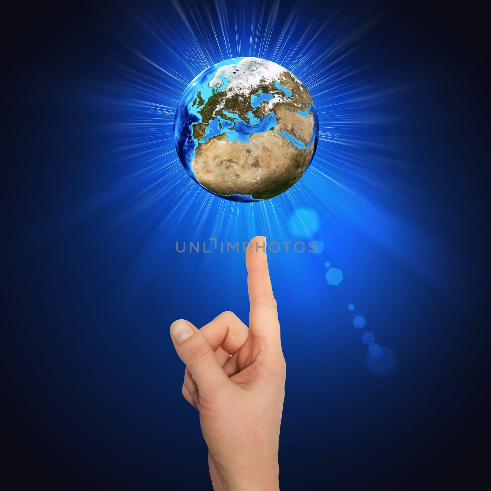 Hand goes to the planet Earth by cherezoff