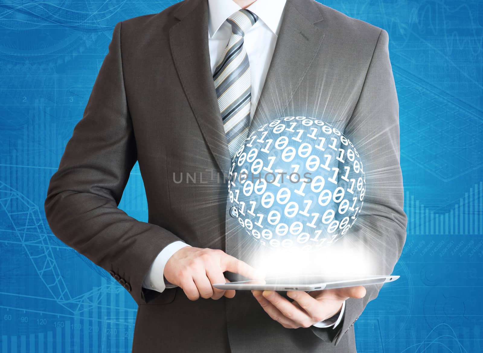 Man in suit holding tablet pc and digital sphere in hand. The computer technologies concept