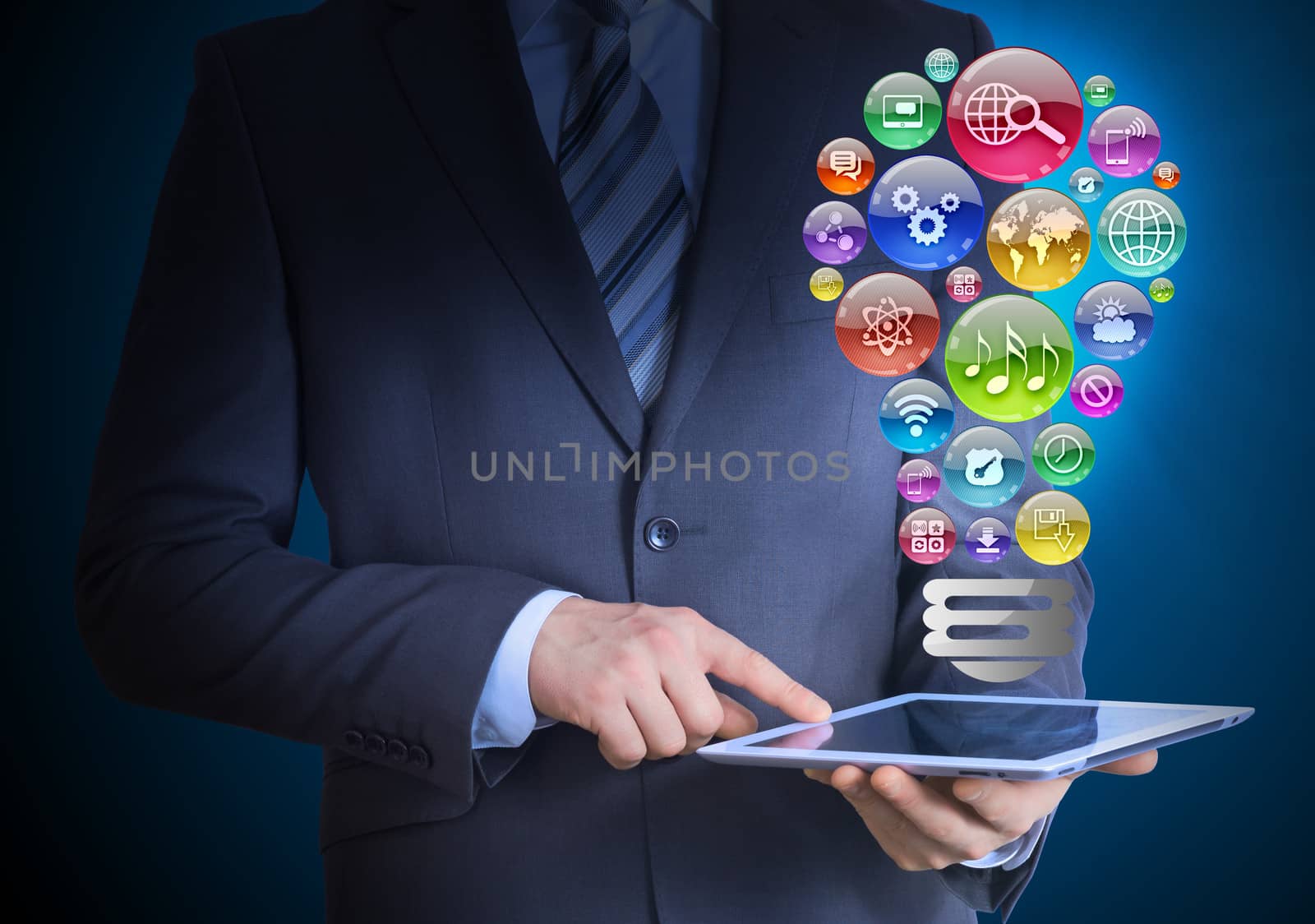 Businessman holding a tablet in his hands by cherezoff