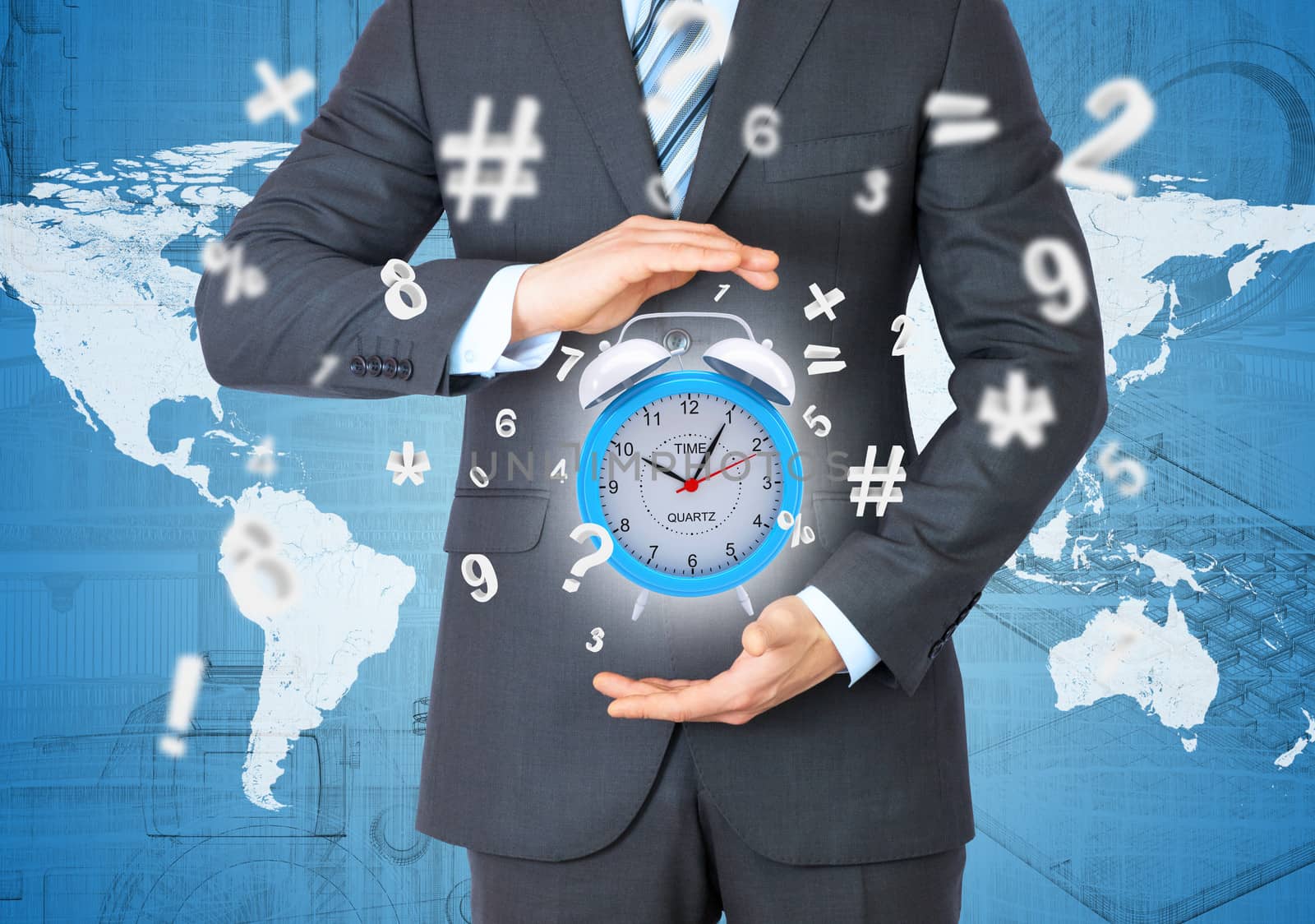 Man in suit holding alarm clock in hand. The concept of time