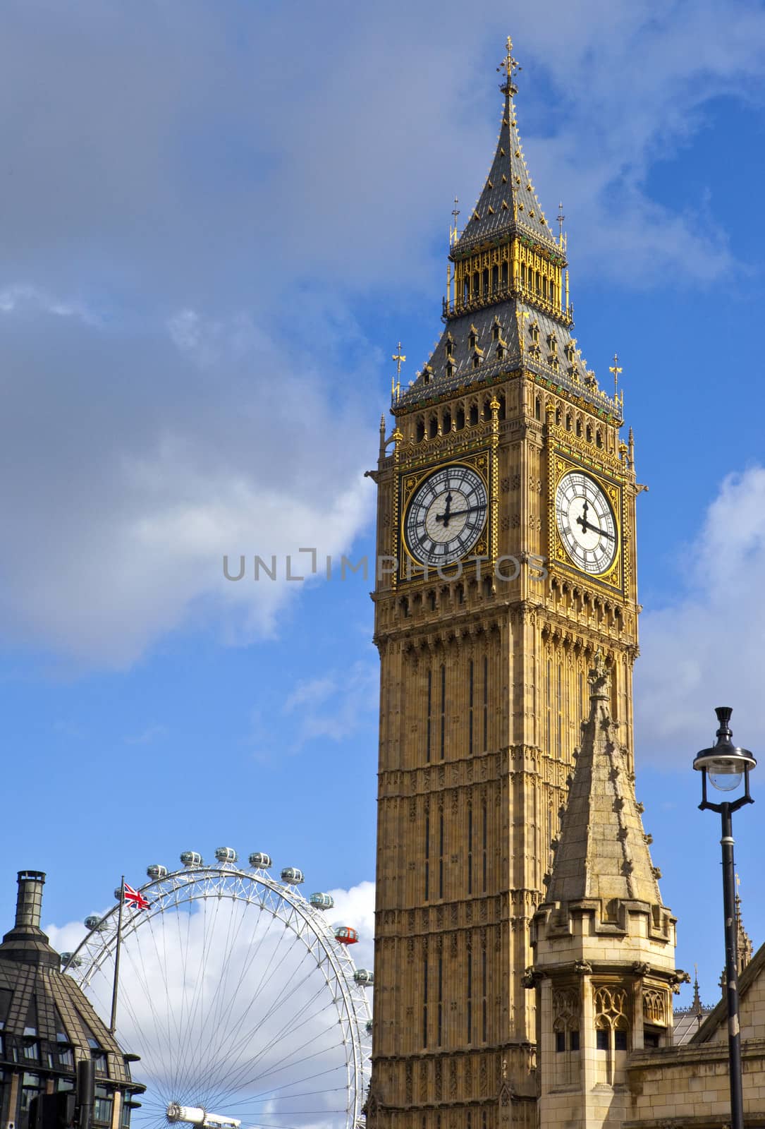 LONDON, UK - 27TH NOVEMBER 2014: A view of Big Ben and the London Eye in London.