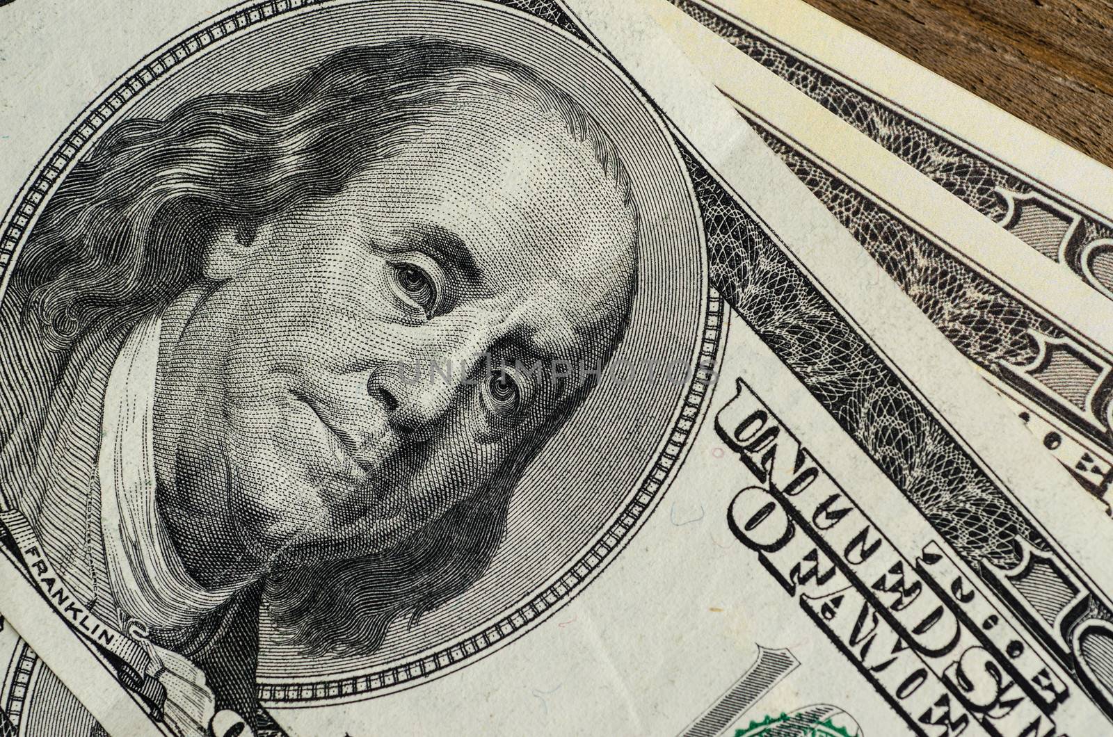 Portrait of Benjamin Franklin on a one hundred dollar bill
