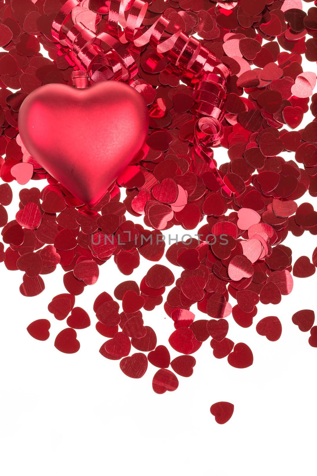 small red hearts confetti and big heart isolated on white background