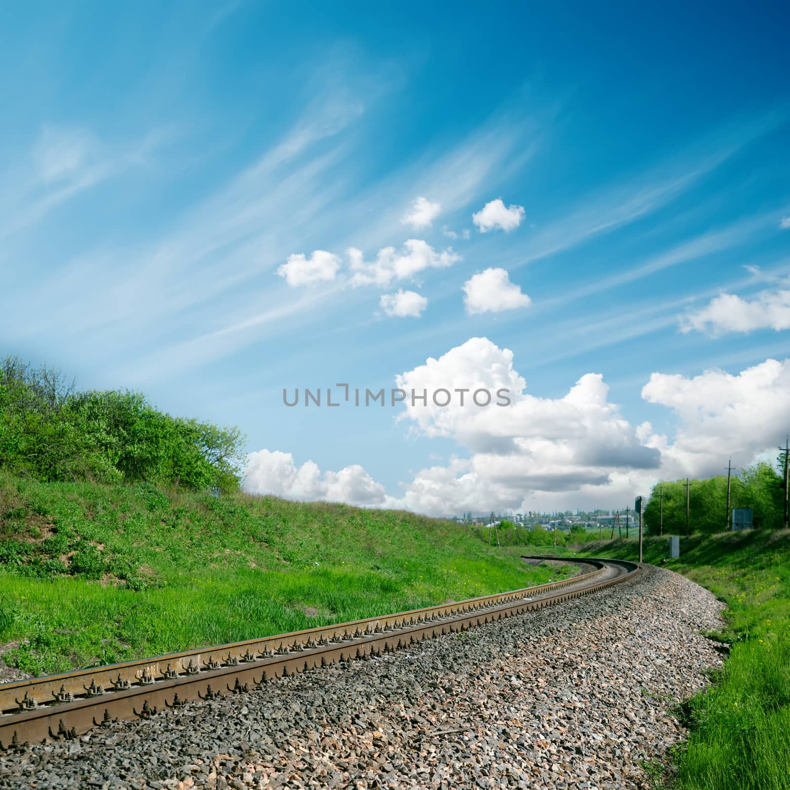 railroad to horizon and cloudy sky by mycola