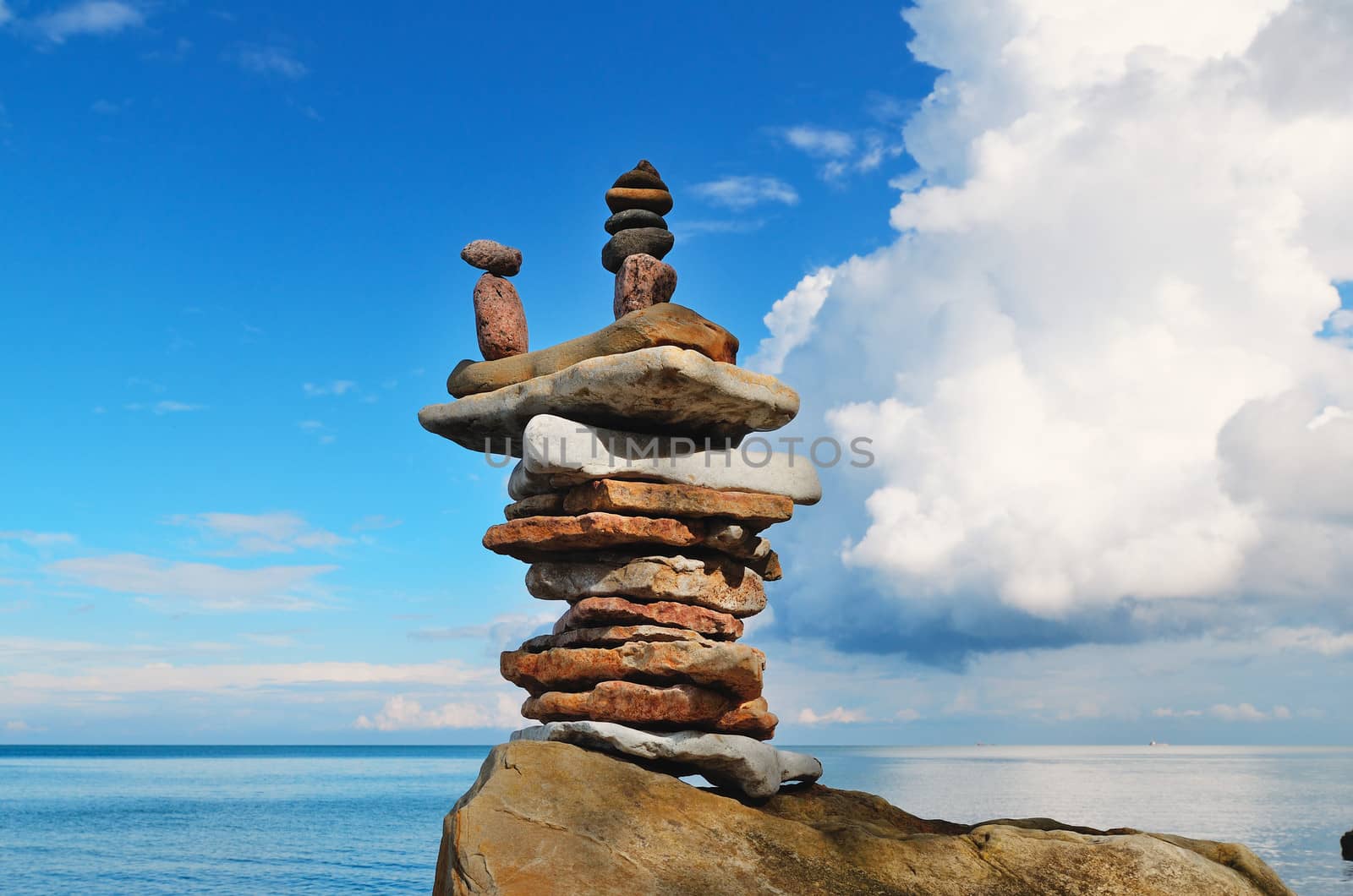 Pyramidal stack of pebbles on the coast