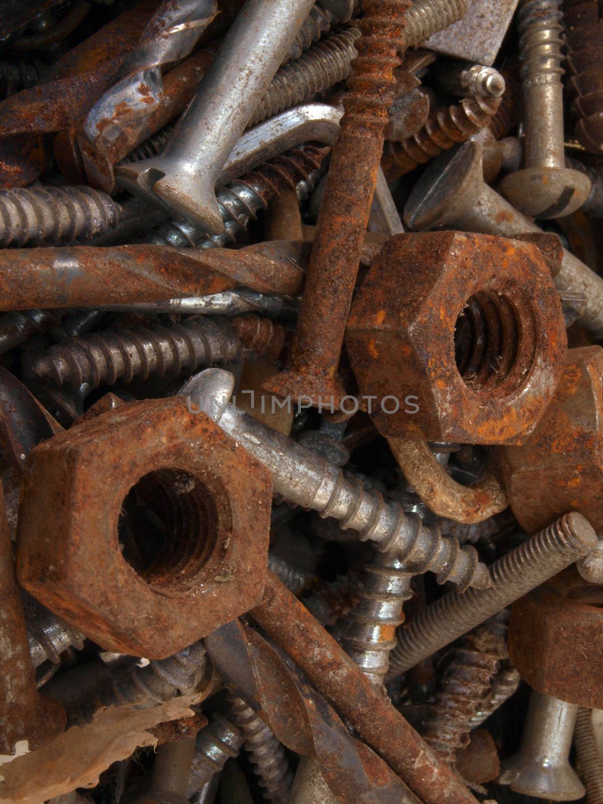 Close up of rusty nuts and bolts.