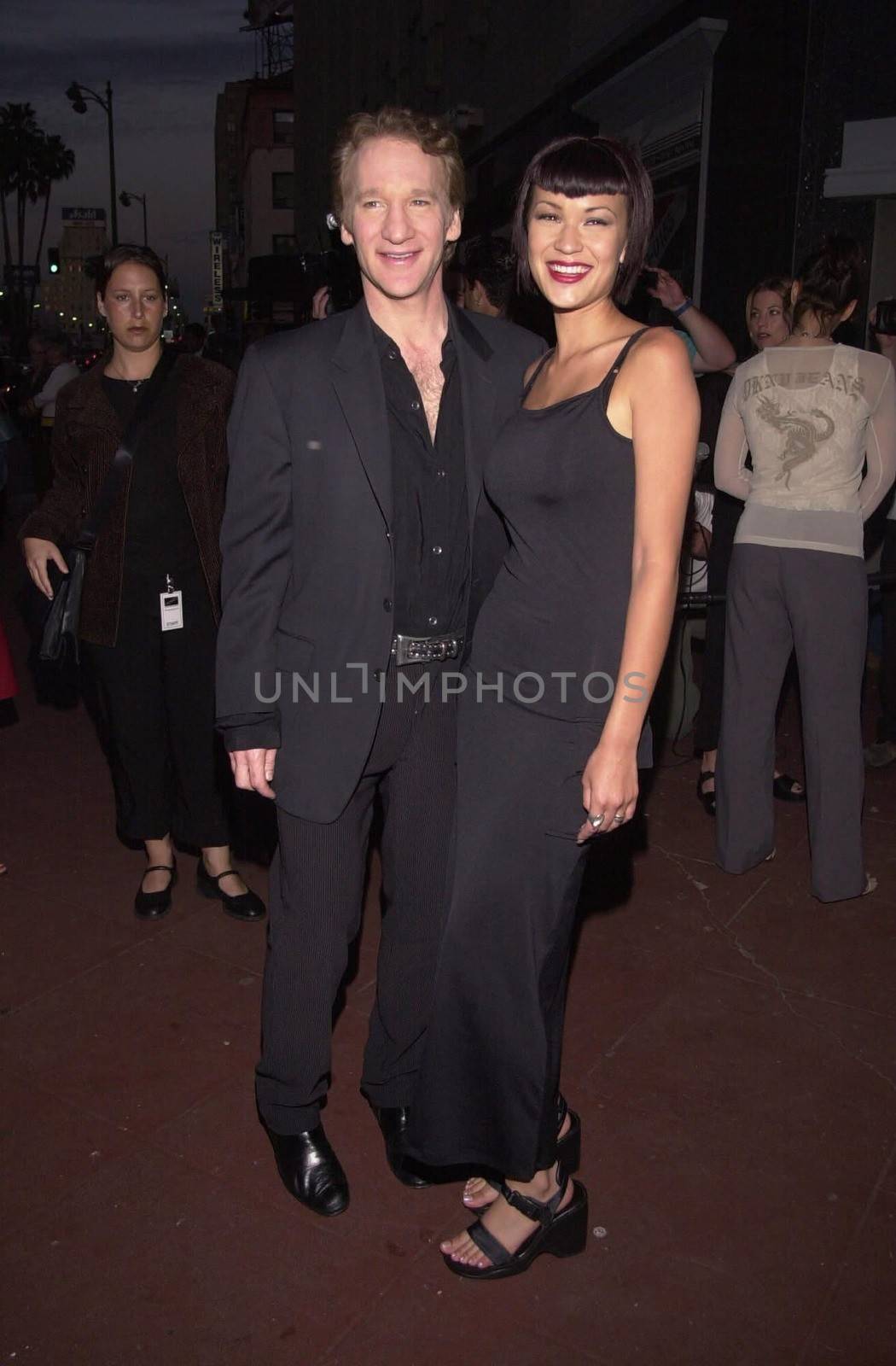 Bill Maher and date at "Framed: A Photo Retrospective" sponsored by Vogue and Donna Karan Eyewear. Santa Monica, 04-13-00