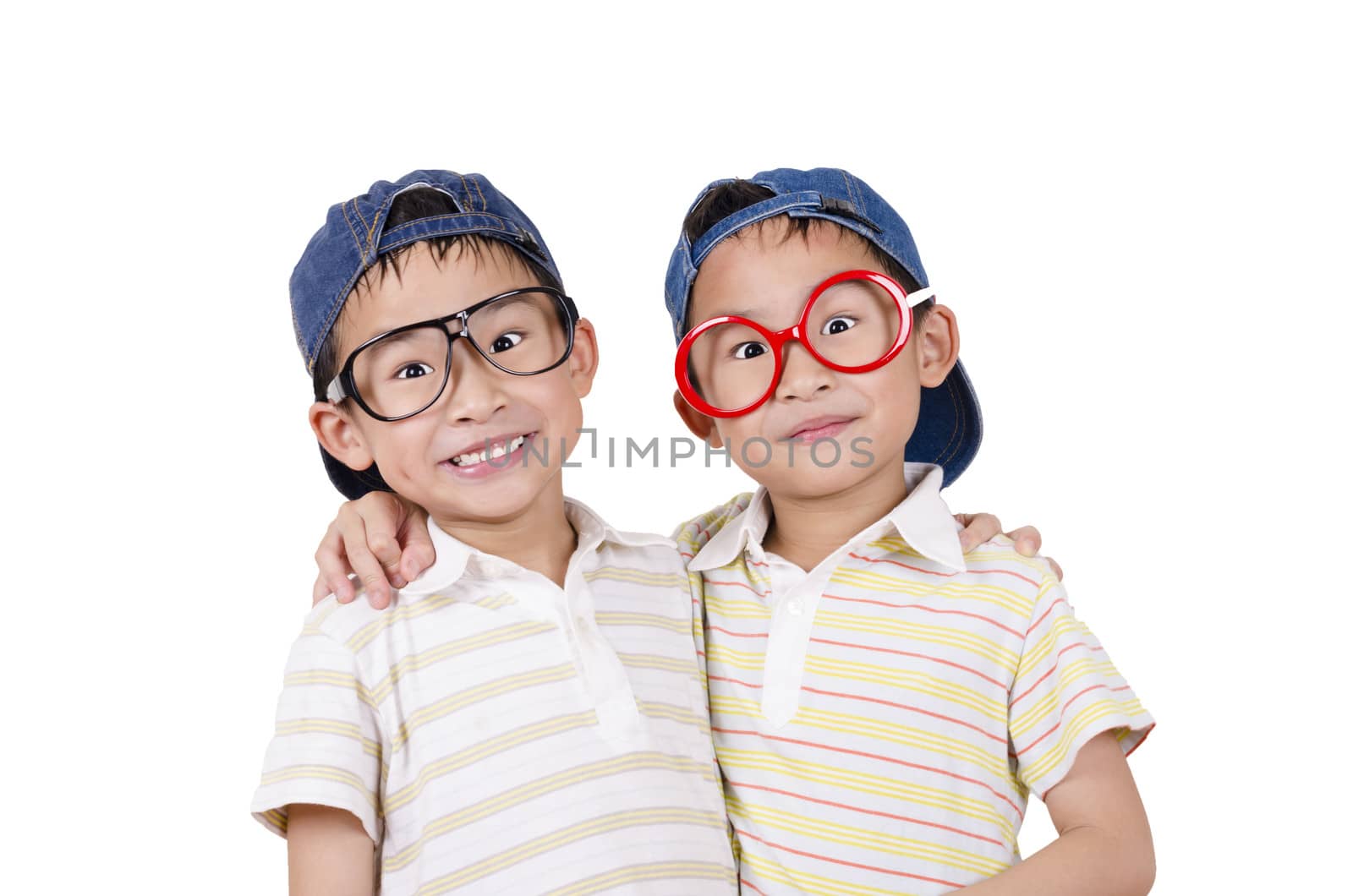 Cute twin  smiling on the white background