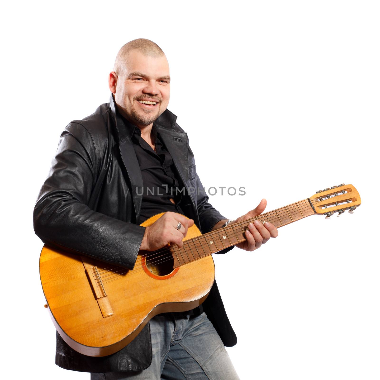 smiling man playing guitar on a white background