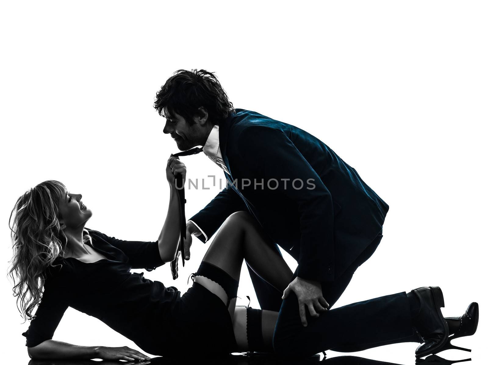 sexy stylish couple caucasian in silhouette on white background