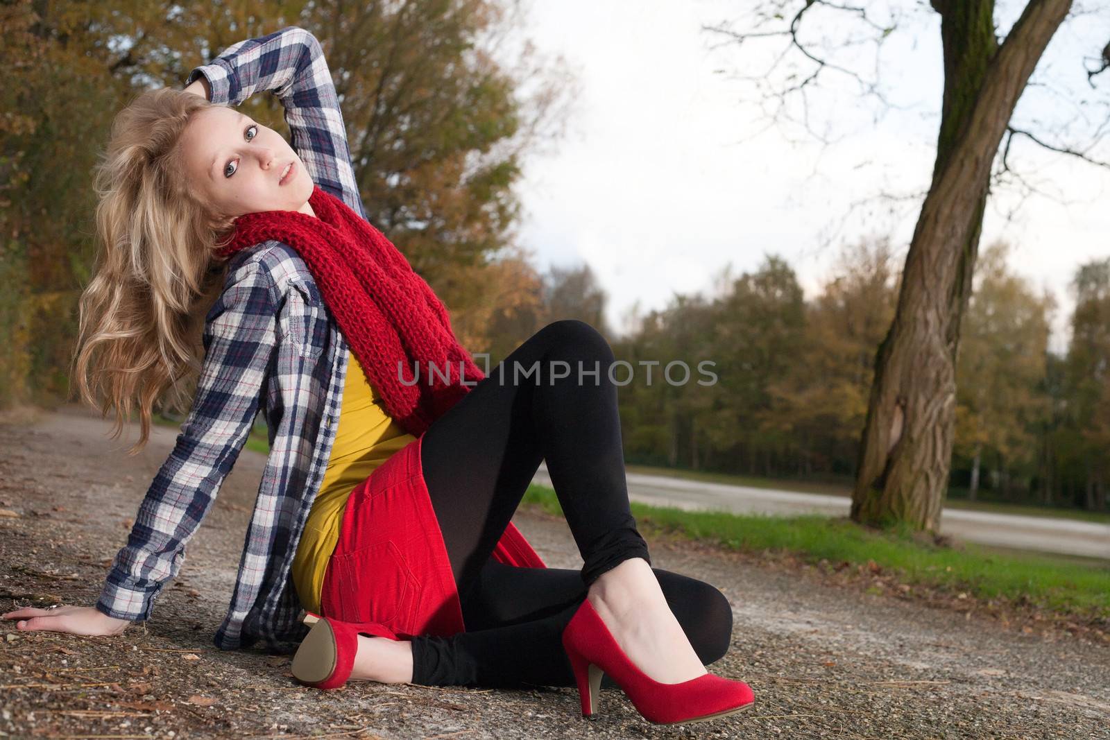 Sitting on the ground with red pumps by DNFStyle