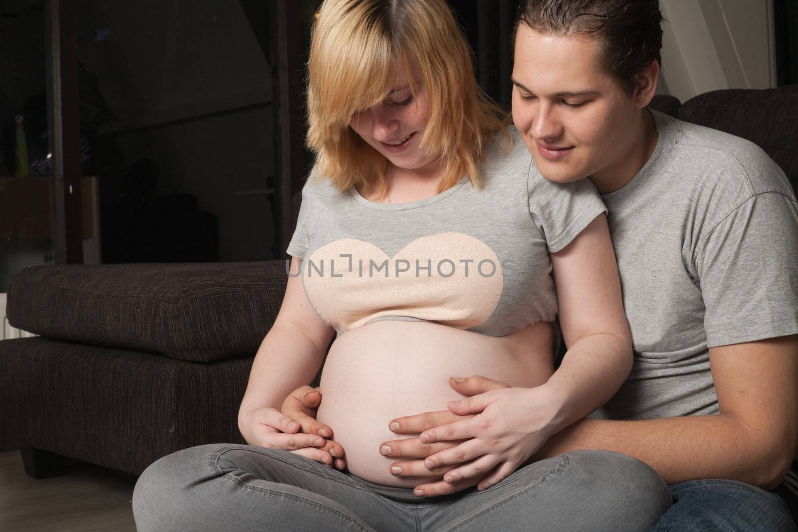 Pregnant couple at home by DNFStyle