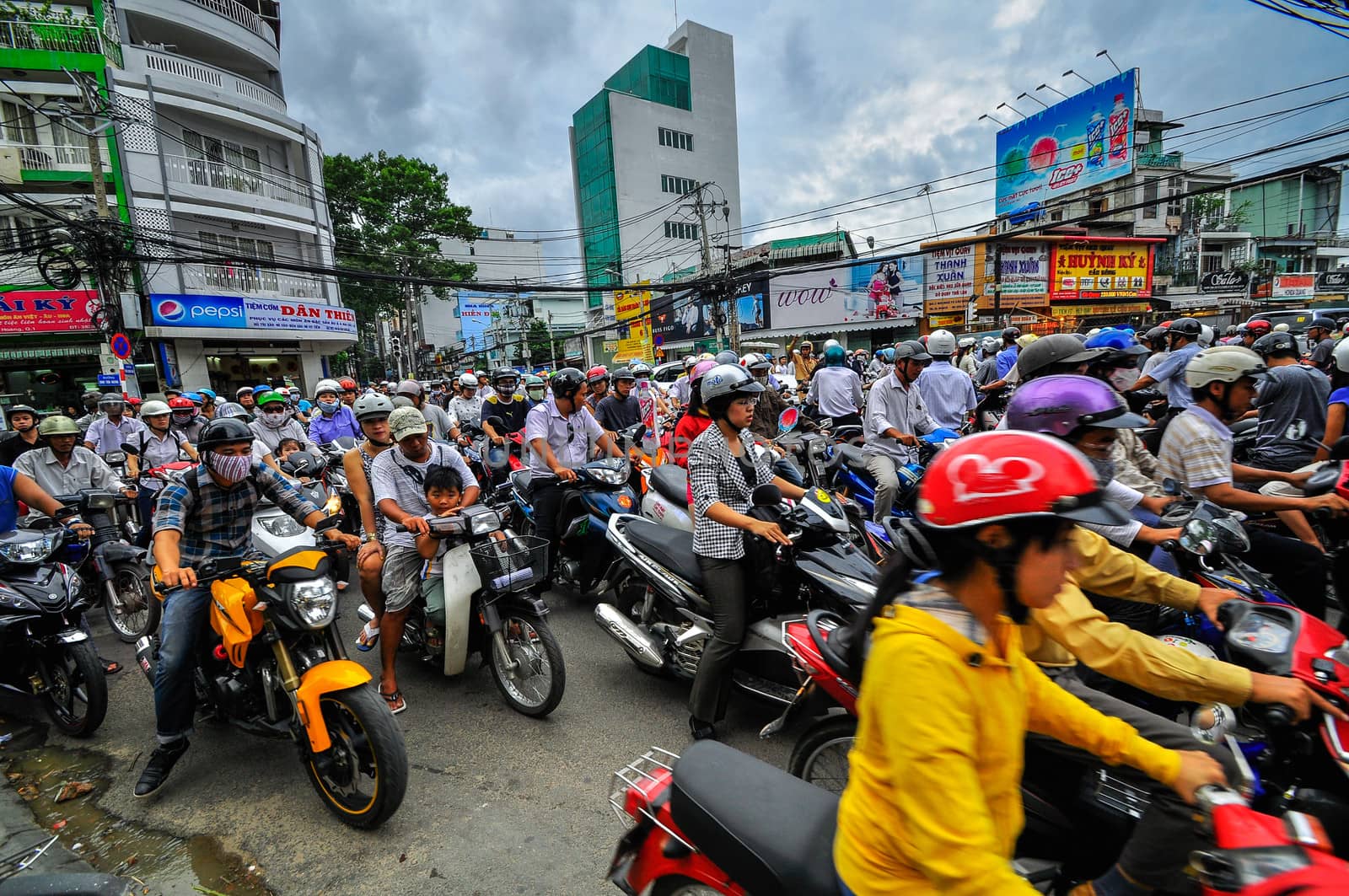 Saigon, Vietnam - June 15: Road Traffic on June 15, 2011 in Saigon (Ho Chi Minh City), Vietnam. Ho Chi Minh is the biggest city in Southern of Vietnam.