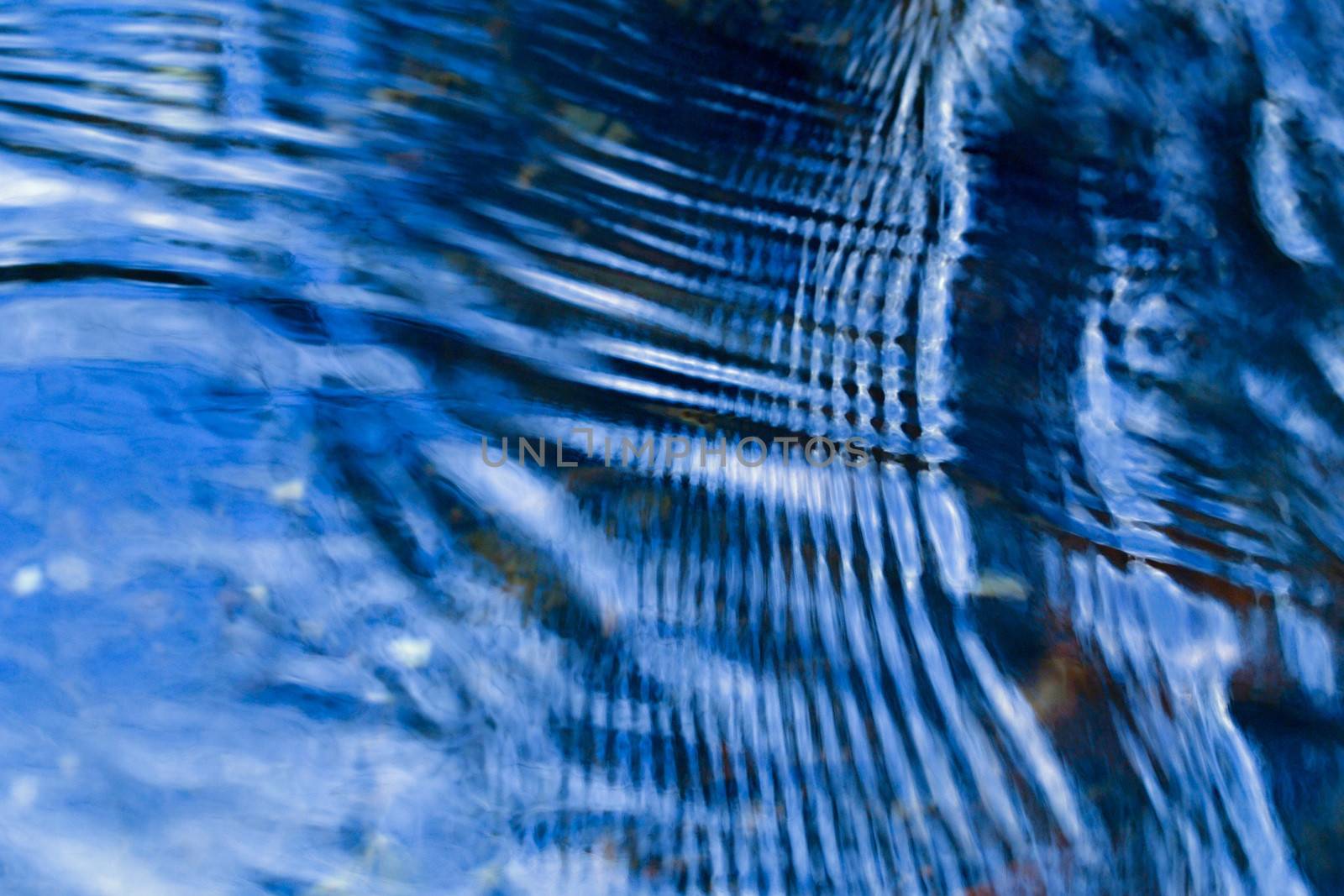 blue ripples on the water by Ahojdoma