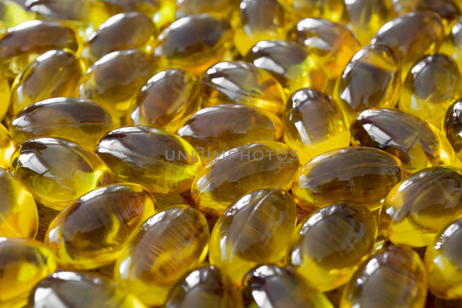 Close up to a several yellow pills