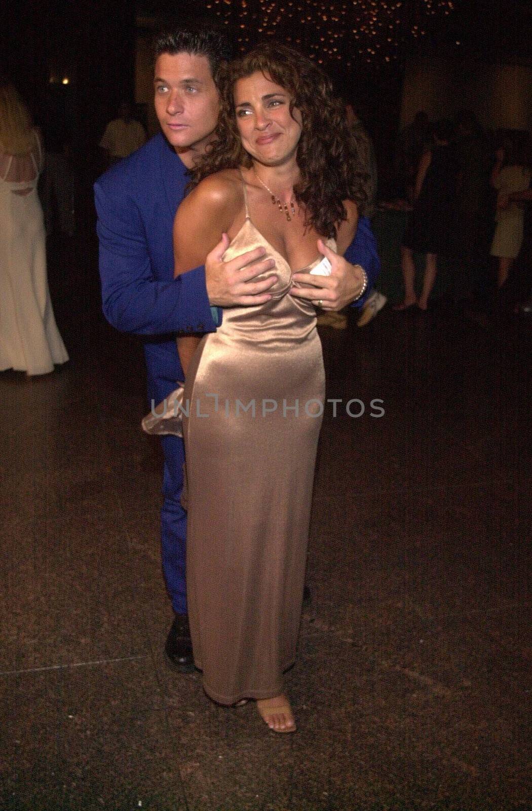 Bryan Genesse and Elizabeth Giordano at the premiere of Very mean Men in Beverly Hills. 08-15-00