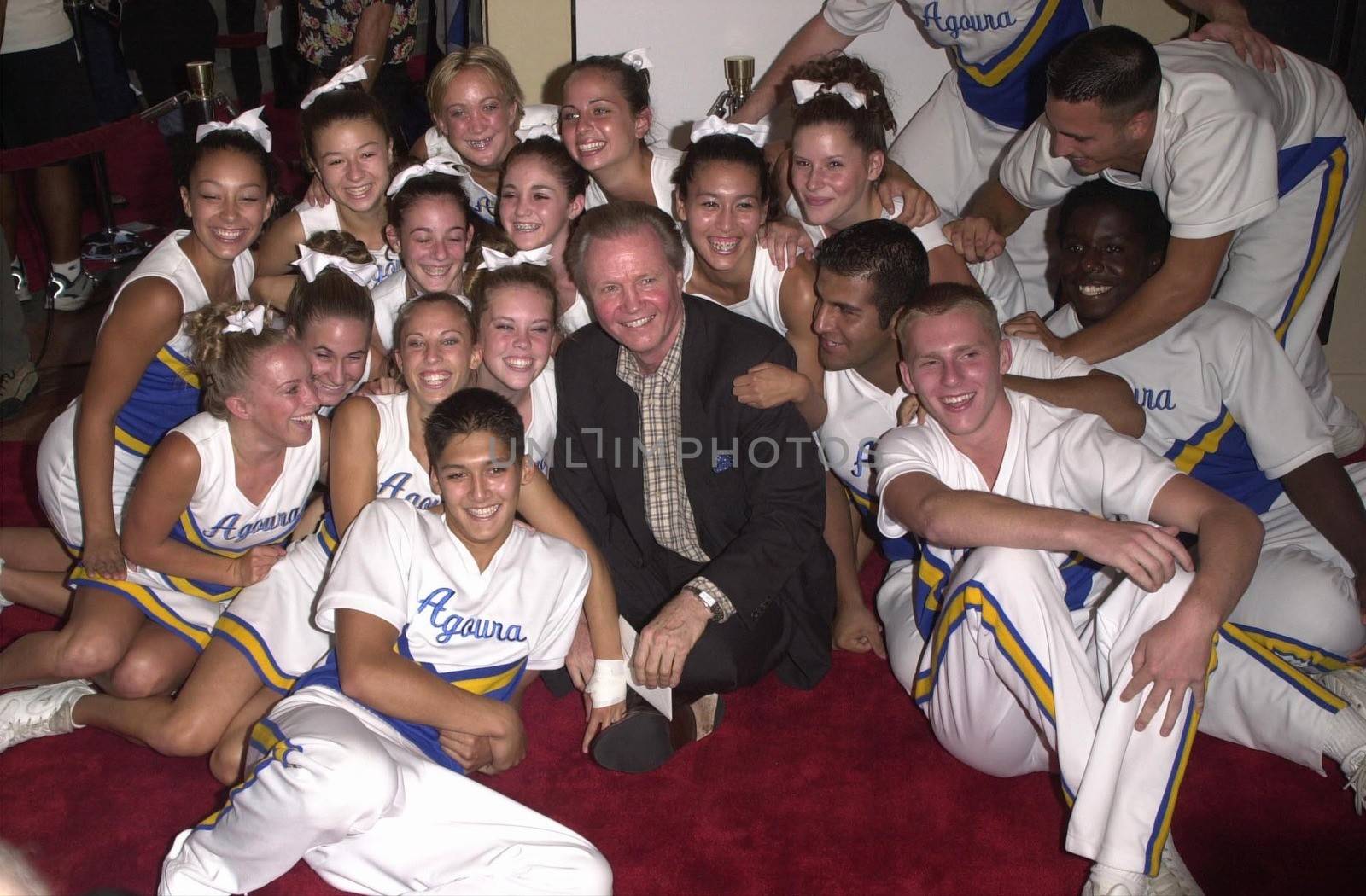 Jon Voight and The Agoura High School Cheerleaders at the premiere of "Bring It On" in Westwood. 08-22-00