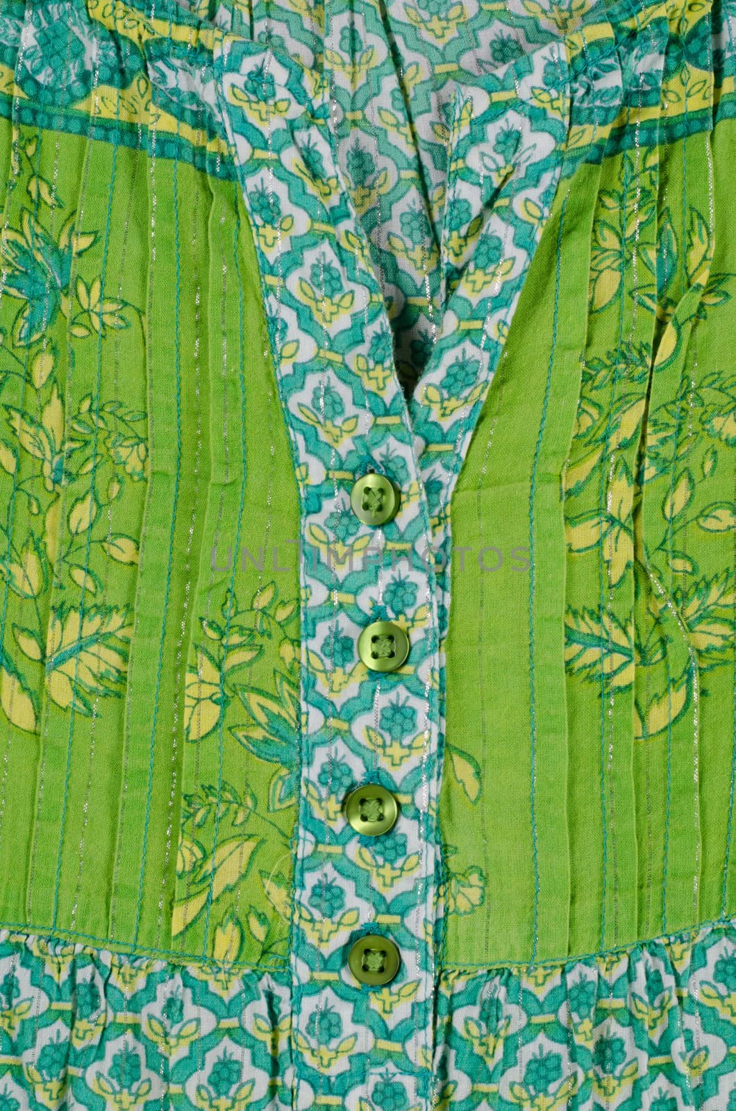 Detail take of a green patterned cotton cloth