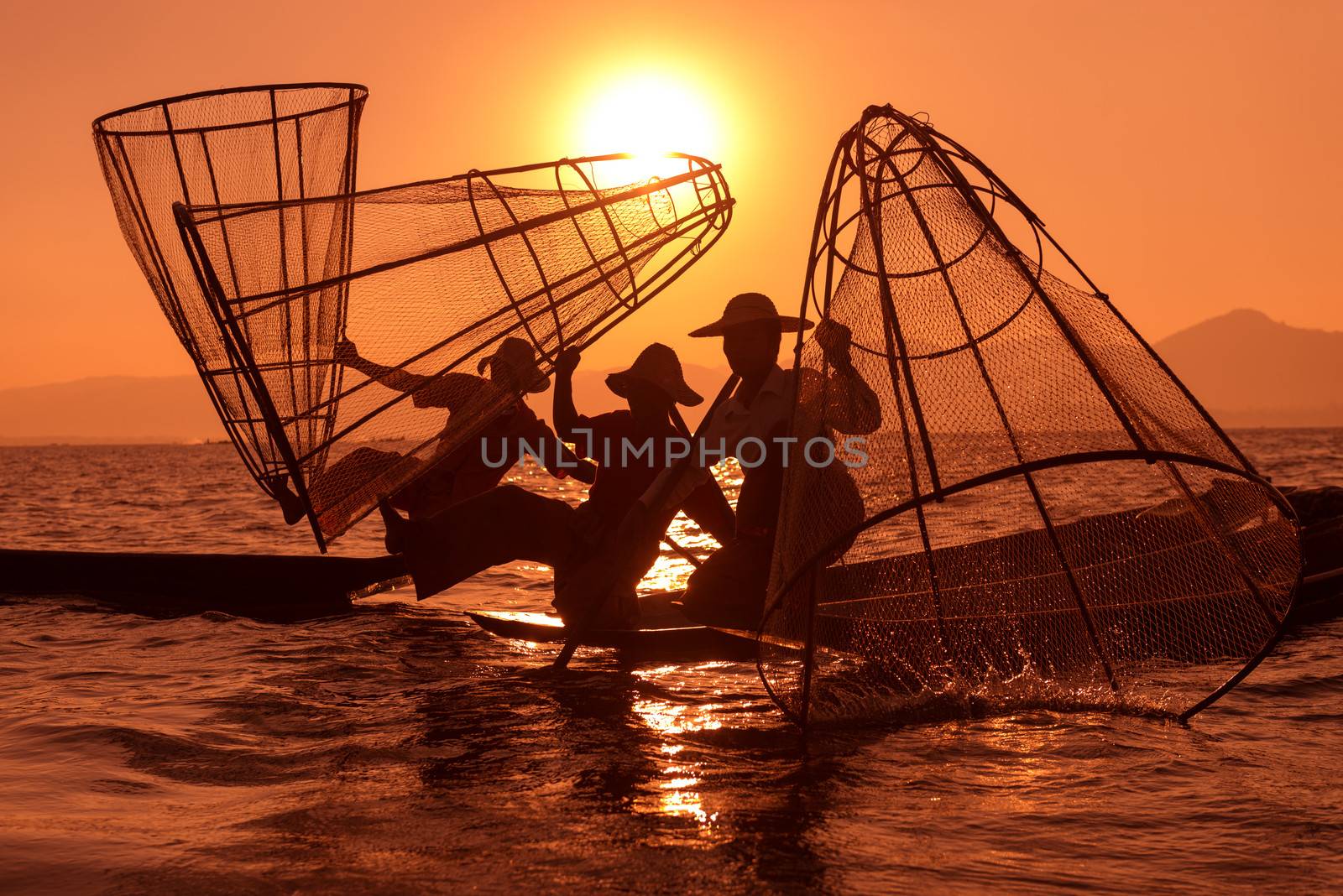 Traditional fishing by net in Burma by iryna_rasko