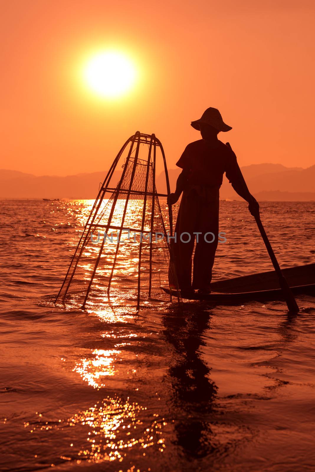 Traditional fishing by net in Burma by iryna_rasko