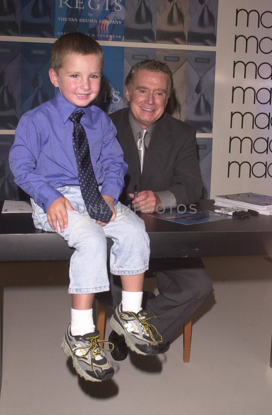 Regis Philbin and Young Fan at Robinson's-May in Beverly Hills to promote new clothes line. 08-23-00