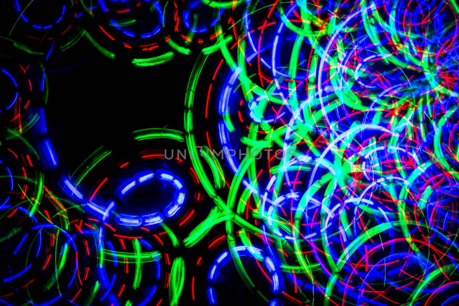 Lines and circles of colored light forming chaos