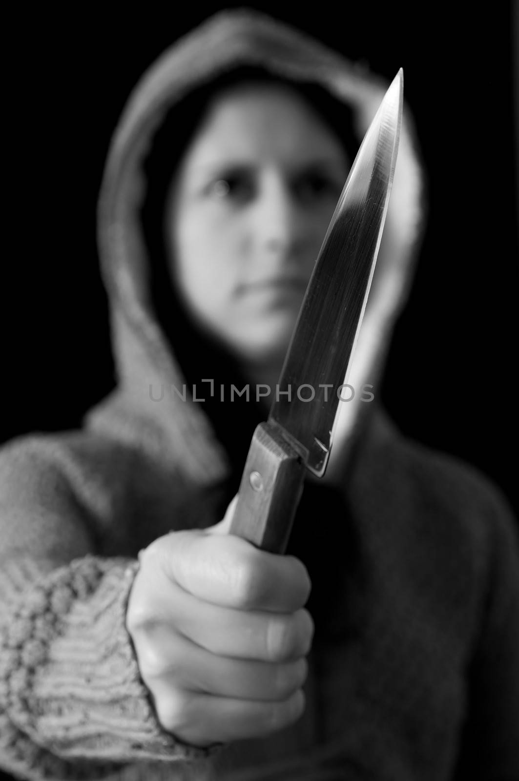 Girl holding a knife by anderm