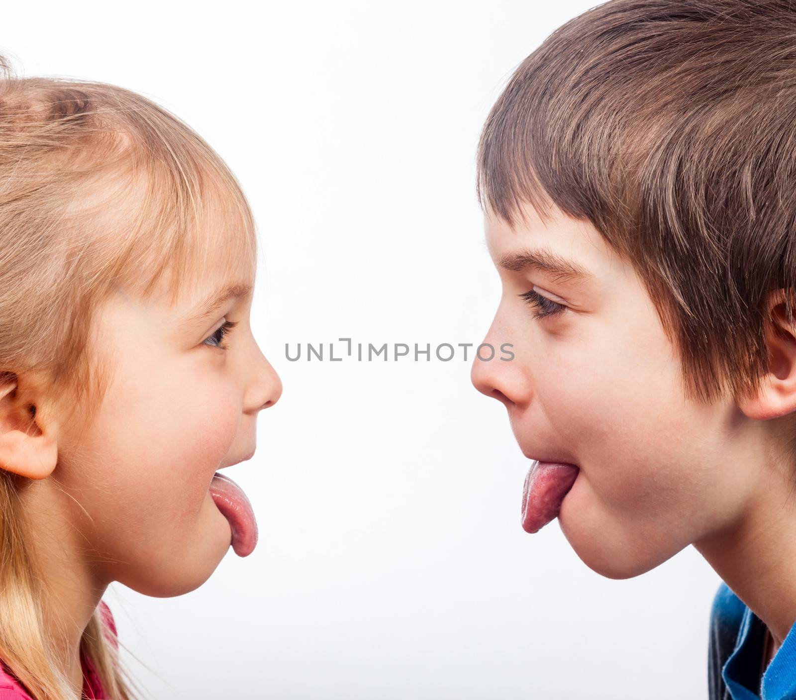Kids sticking out tongues by naumoid