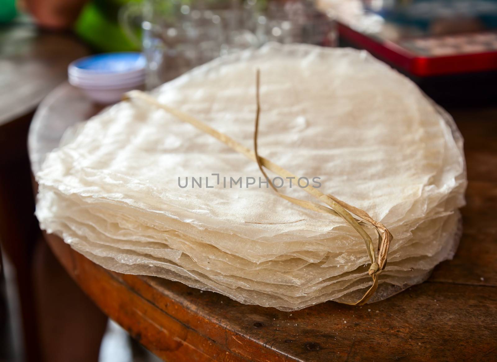 Vietnamese dry rice wafers (Banh trang or banh da nem) on a table
