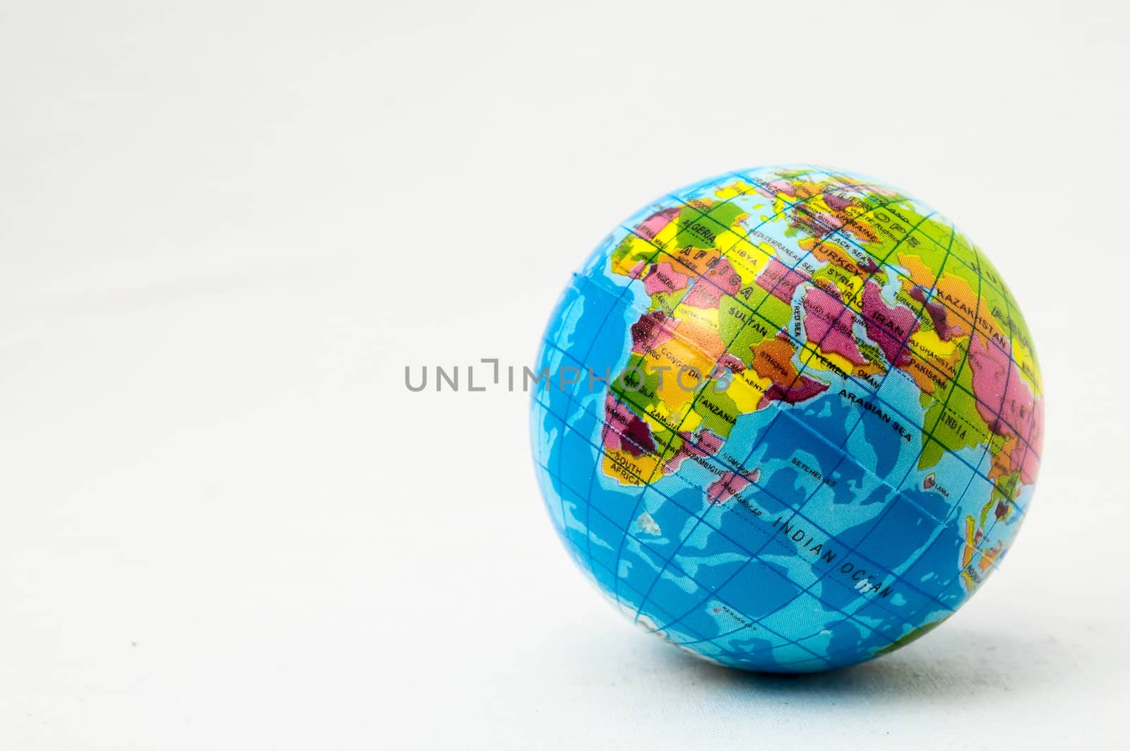 The World Globe Made of Rubber on a White Background