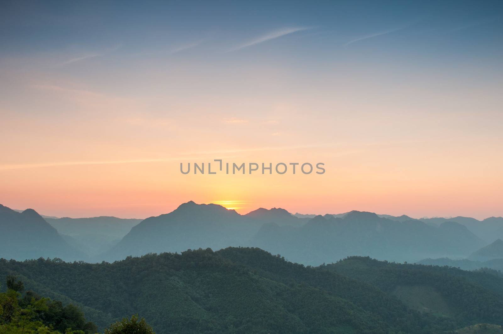 Majestic sunset in the mountains landscape. by Sorapop