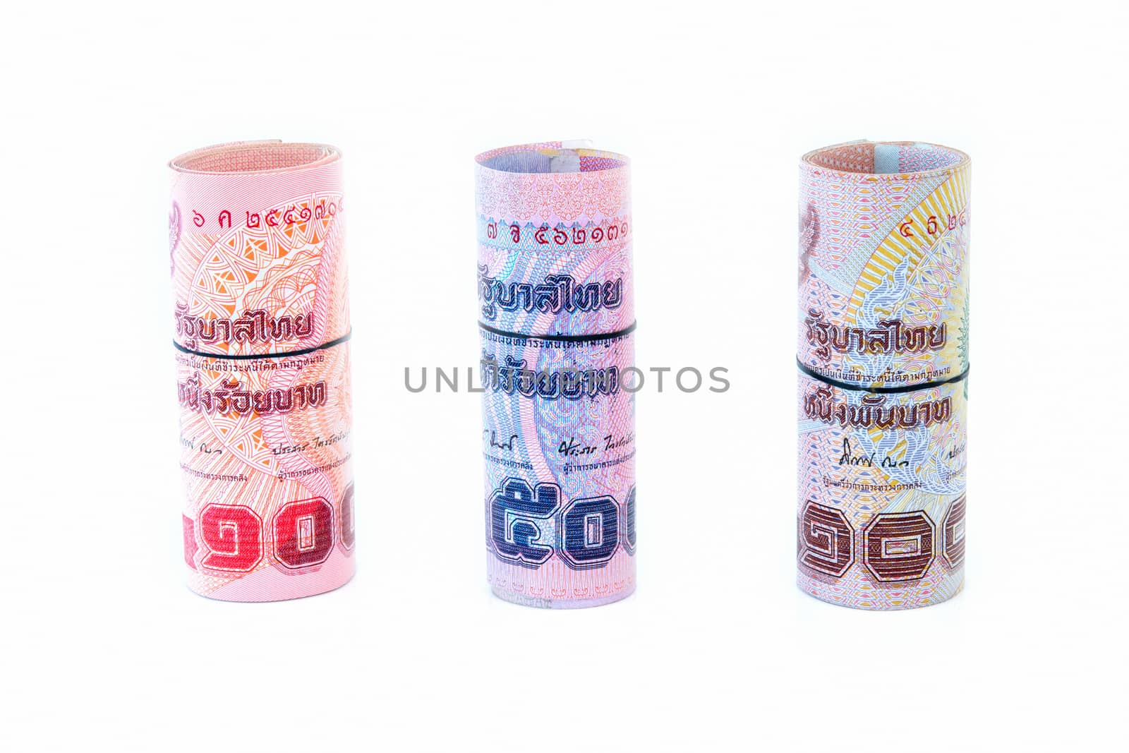 Rolls of bank Thai currency on white background