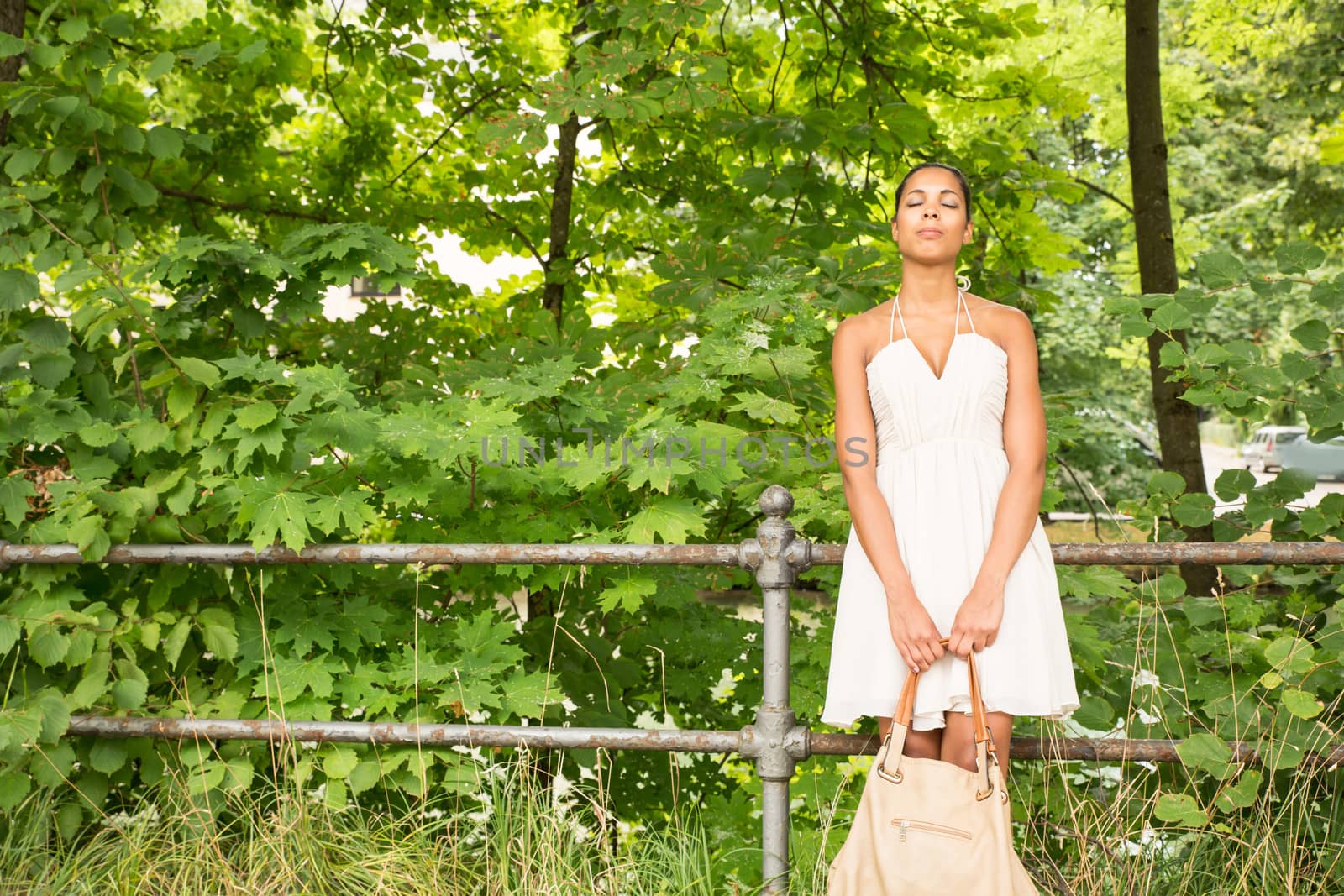 Young Girl in the park	 by Spectral