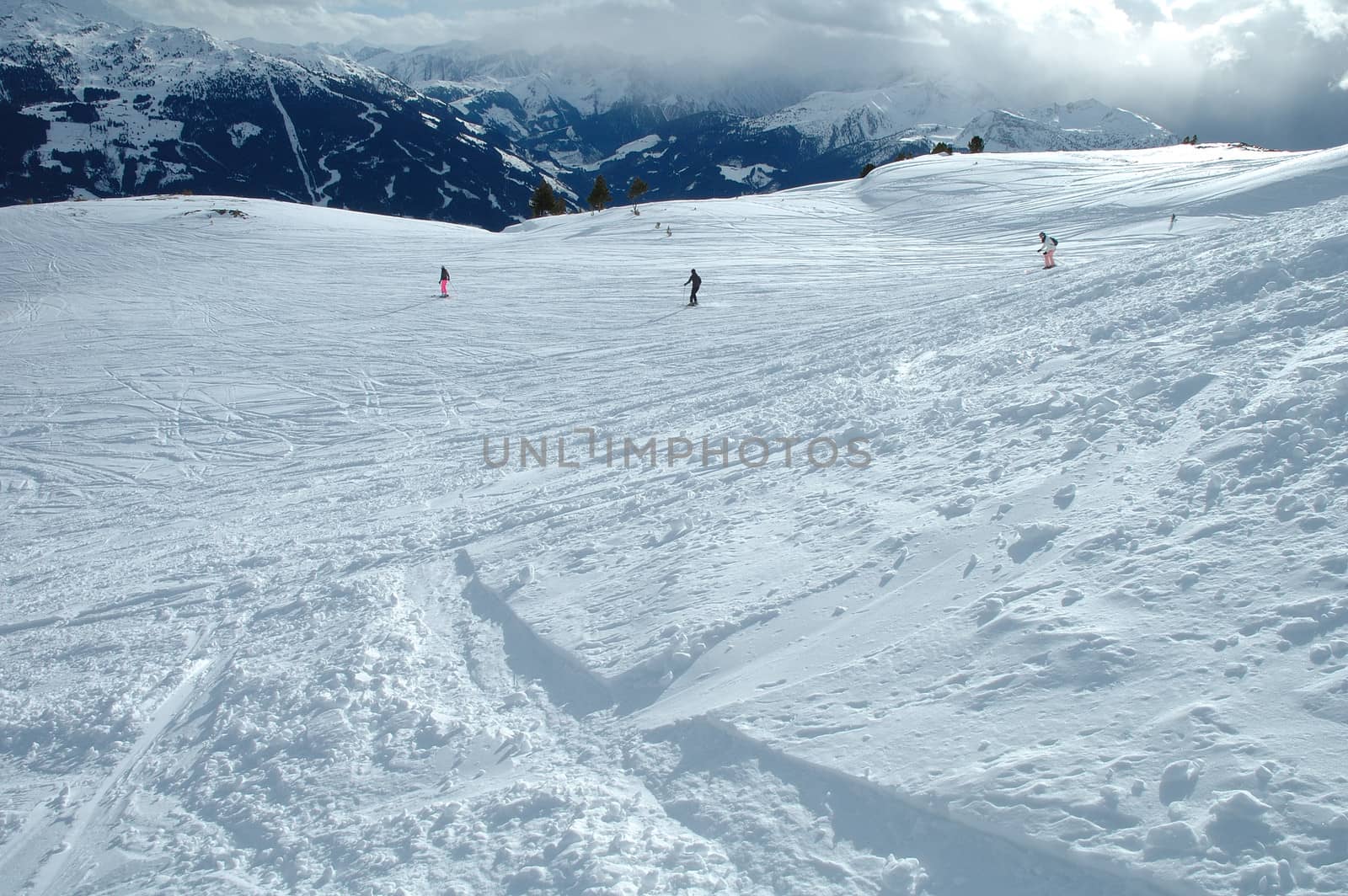 Ski slope and skiers in Austria nearby Kaltenbach in Zillertal valley