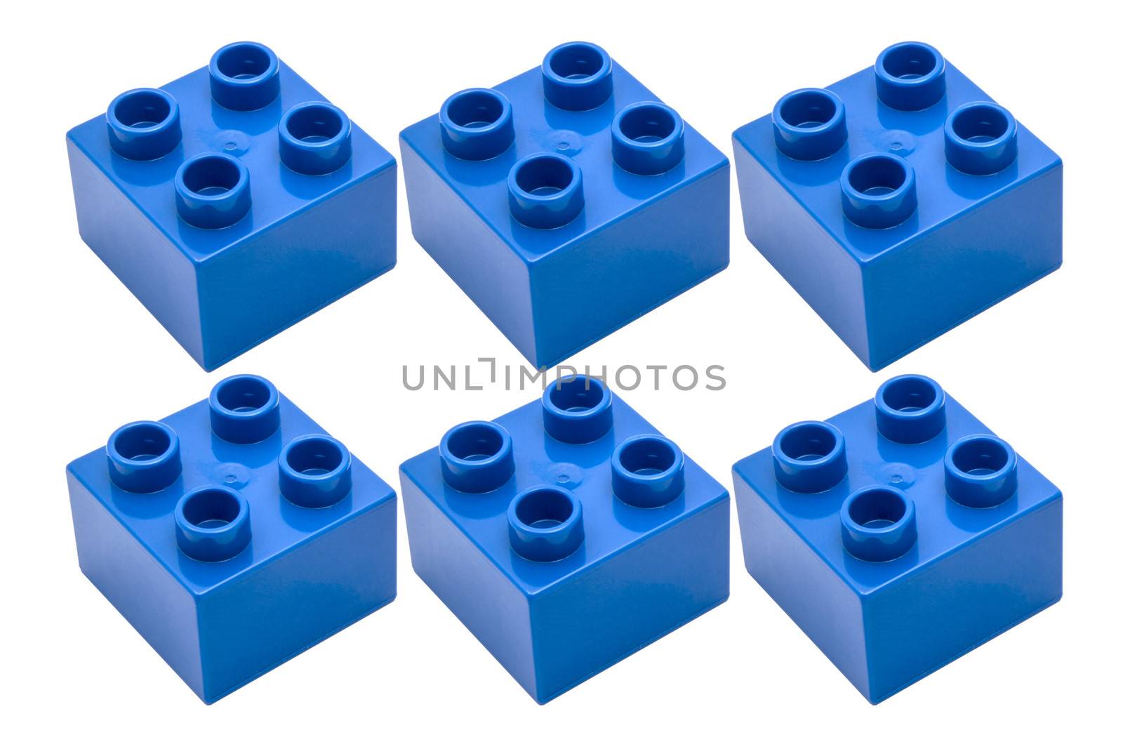 Blue building blocks closeup on white background 