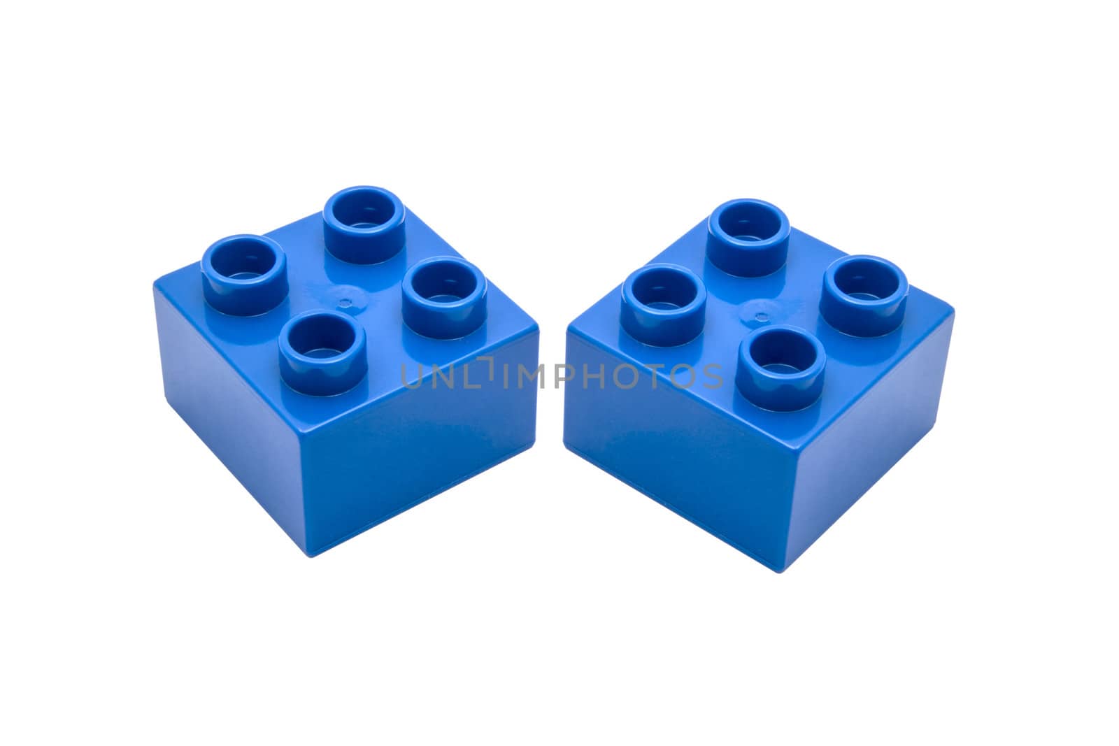 Blue building blocks closeup on white background 