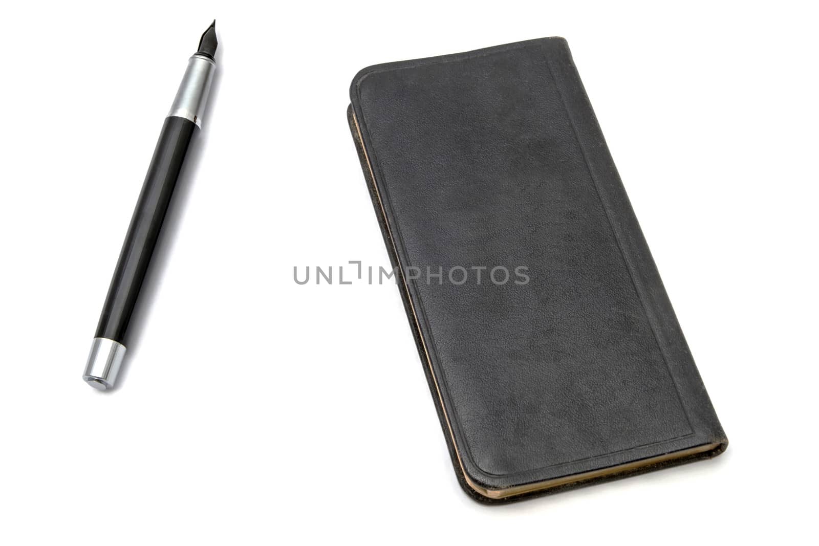 Book and Pen by ibphoto