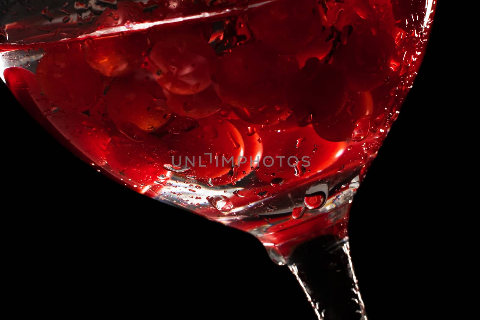 fresh fruit in the water on a black background