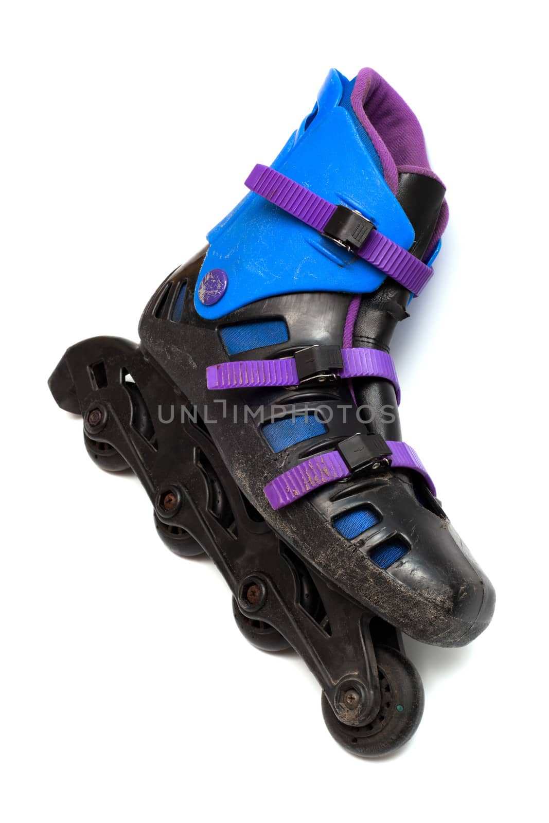 old roller skates on a white background